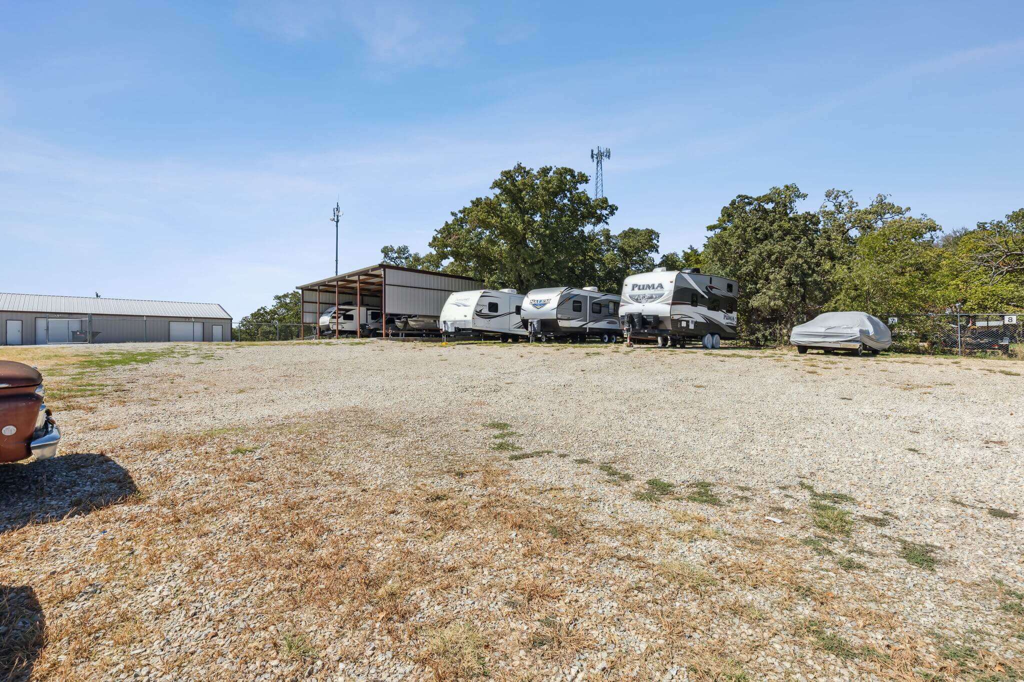 Outdoor uncovered vehicle, boat, RV camper parking in Azle, TX